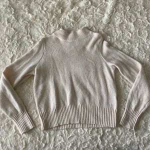 Cream sweater